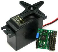 Pololu Micro Serial Servo Controller next to a standard-size RC servo.