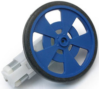 Solarbotics GMPW blue plastic wheel with molded tire and encoder stripes, mounted on a GM9 gearmotor.