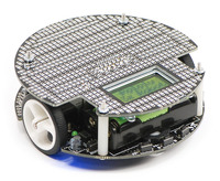 3pi expansion kit with cutouts mounted on a 3pi robot (black solder mask version).